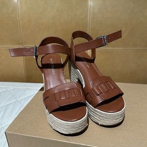 The brand is Marc Fisher. Size 6.5